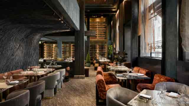 Upscale Southwick restaurant for corporate dinners and networking events with intimate booth seating.