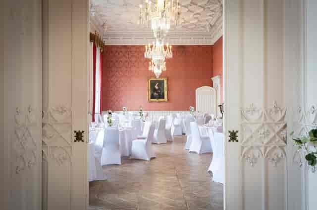 Elegant Main Hall venue with chandelier, perfect for gala dinners and wedding receptions.