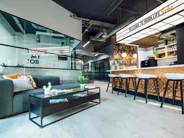 Modern Soho Square venue with lounge seating and bar for networking events and corporate meetings.