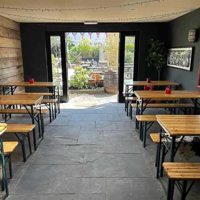 Upstairs Function Room at The Shortlands Tavern with rustic bench seating for casual events.