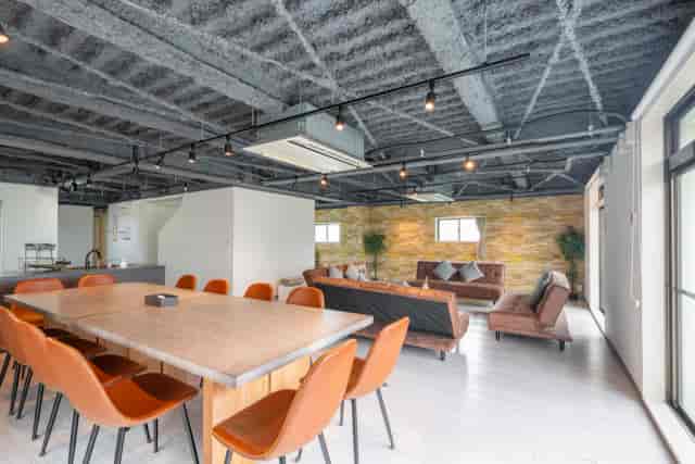 Industrial-chic 1F Studio in Daikanyama: versatile workshop and board meeting space.
