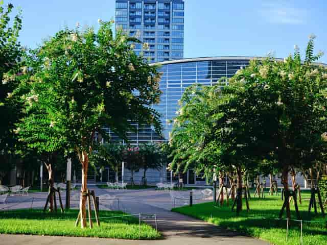 Modern Togo-Kinenkan convention center plaza for outdoor networking events and business receptions.