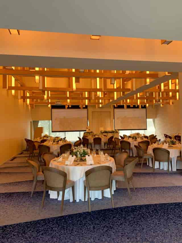 Togo-Kinenkan event space with timber ceiling, ideal for luxury banquets and corporate conferences.
