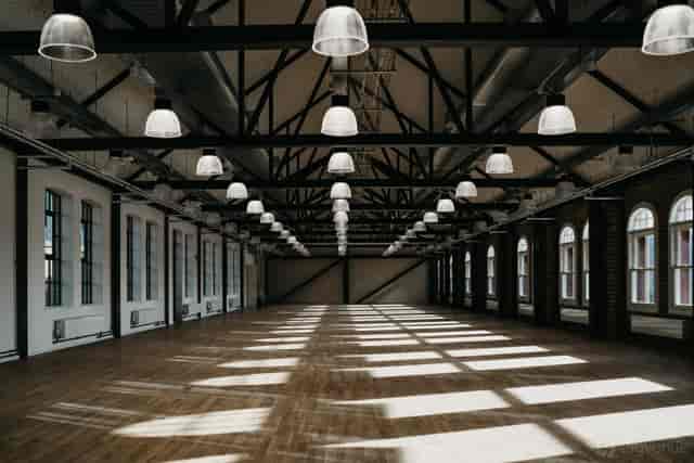 Main Hall at CFC Studio: Industrial-chic event venue with high ceilings for weddings and parties.