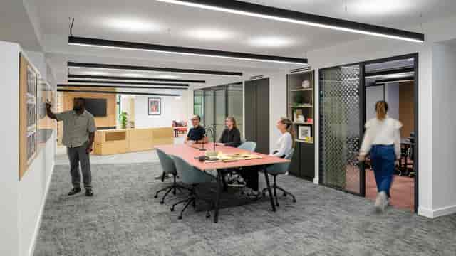 CFC Studio 1 agile breakout space with boardroom setup for hybrid planning and brainstorming.