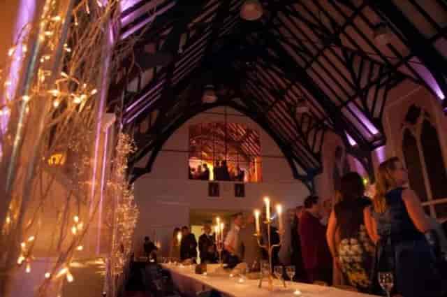 St. Mary's Priory Hall with vaulted ceiling, perfect for sophisticated evening corporate events.