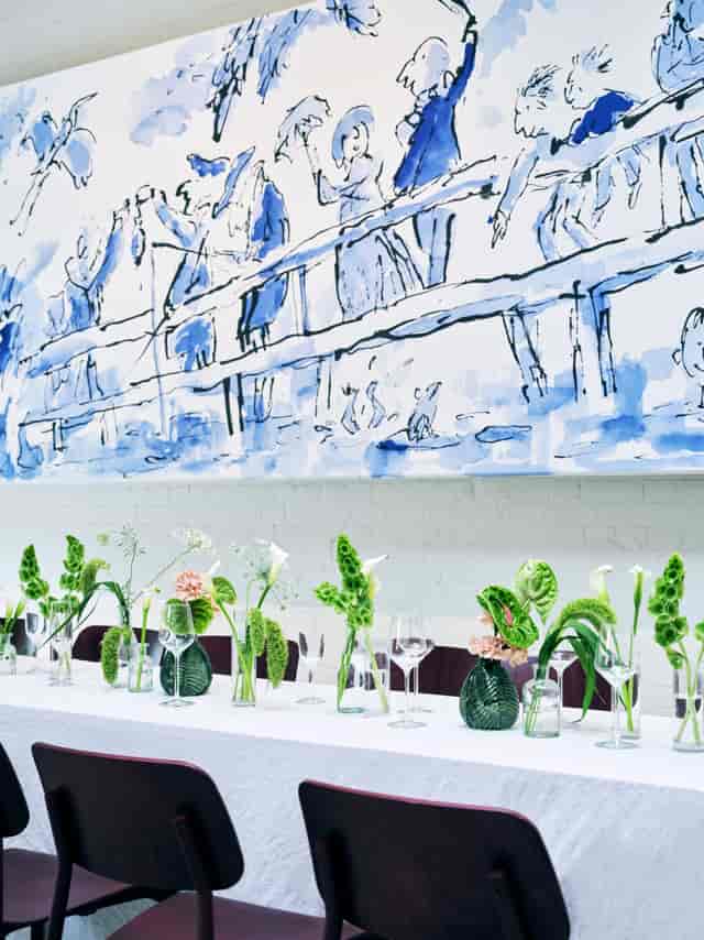 Boiler House Cafe wildflower tablescape for high-end dinner or sophisticated corporate reception.