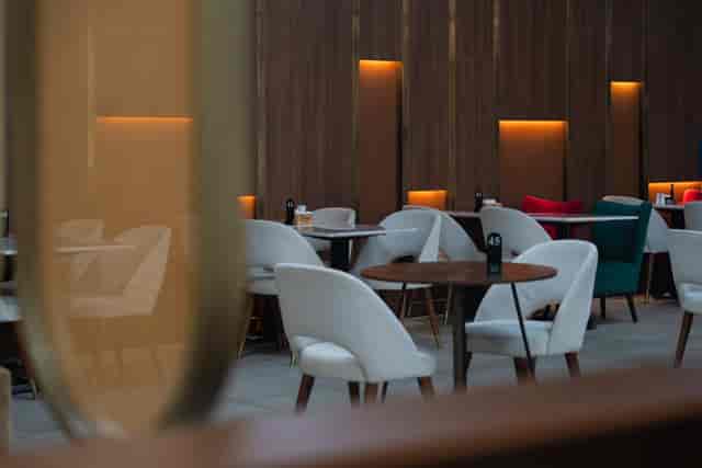 Sophisticated indoor dining area with lounge seating for networking and corporate events.