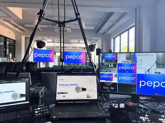 AV control station for hybrid corporate town hall at Tava London event venue.
