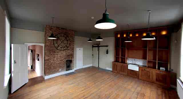 Rustic-chic Orangery at TT Liquor, ideal for boutique boardroom meetings and catered events.