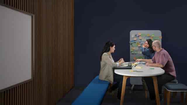 Collaborative breakout room with whiteboards for corporate workshops and team ideation sessions.