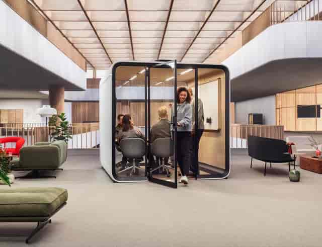 Modern modular meeting pod for corporate event huddle spaces and professional breakout sessions.