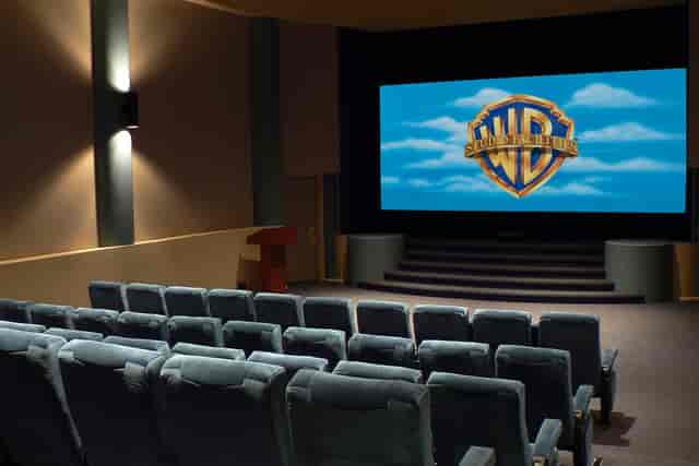 Soho Screening Rooms: Tiered theater with stage for corporate presentations and AV events.