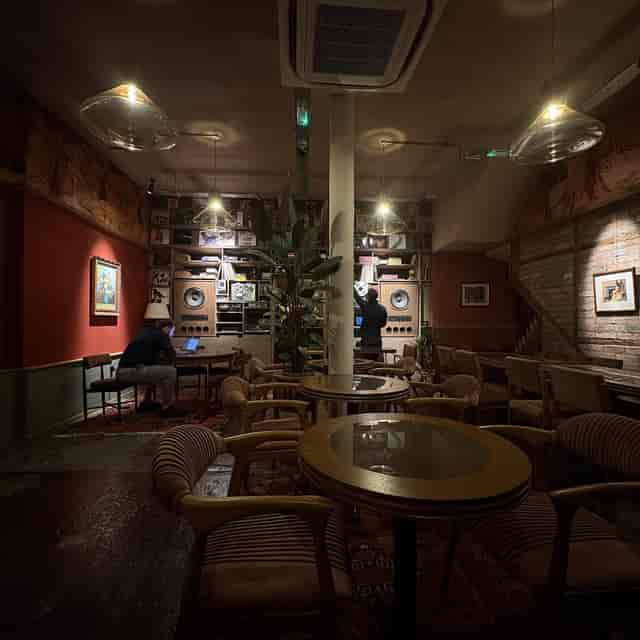 Back Bar at The Old Grocery Store with moody lighting for networking and private events.