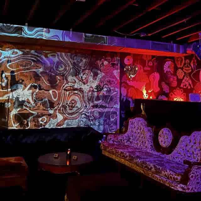 DJ booth in The Perception W London with mood lighting for brand activations and after-parties.