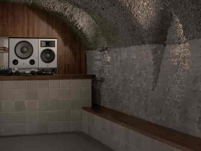 DJ booth in The Perception at W London with industrial-chic design for VIP event venue hire.