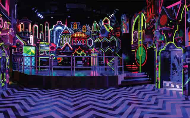 Neon DJ booth at W London for high-energy brand activations and modern conference events.