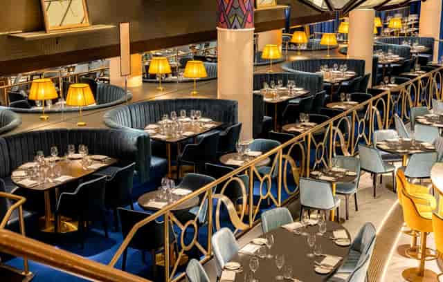 El Chicos SW16: Tiered indoor dining area for corporate networking and breakout sessions.