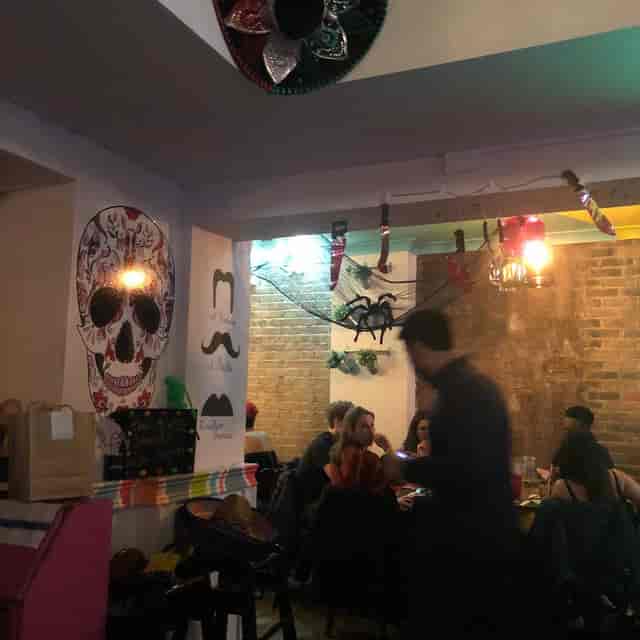El Chicos SW16 cozy indoor dining area for intimate pop-up social mixer events.