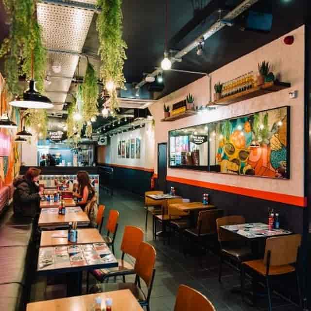 Mexican Tropical Garden venue with modular seating for networking and social pop-up events.