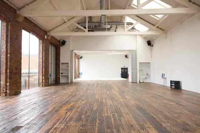 Studio 101 industrial venue with exposed brick, perfect for brand activations and pop-up events.