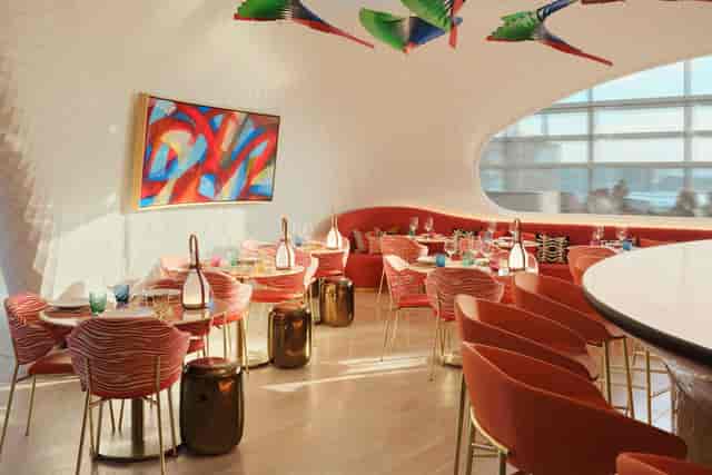Cream Room studio with bold seating, ideal for VIP dinner or creative workshop space.