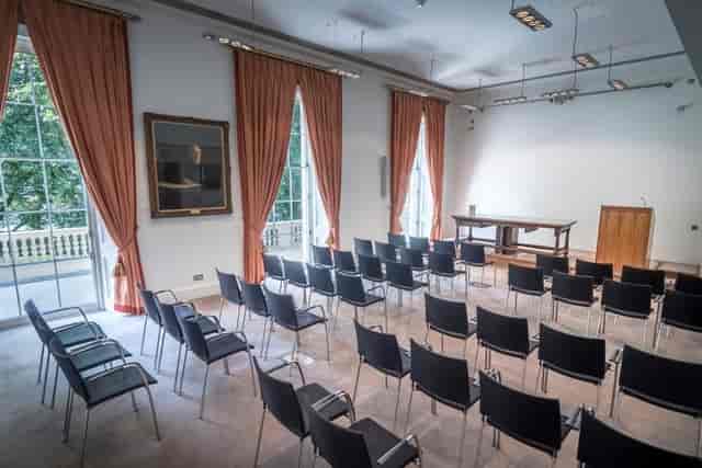 Theater-style Historical Association meeting room with natural light for lectures and presentations.