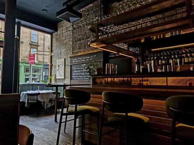 Main Bar at The Finnieston with rustic walls, ideal for corporate receptions and VIP dinners.