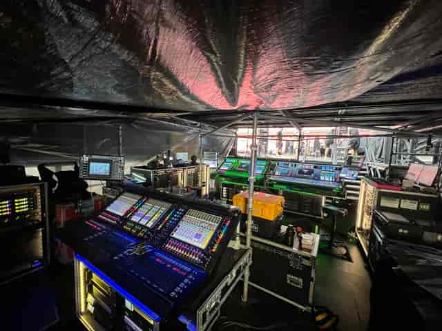 FOH control room with professional mixing consoles for event production and stage management.