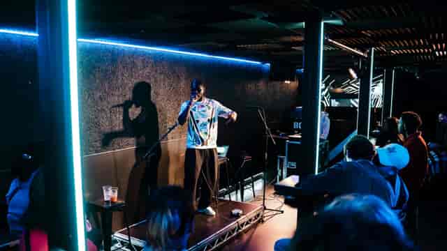 Lounge area and bar at Tensor Studios with LED mood lighting for private event or party venue.