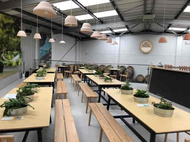 Cloudwater Brewery industrial event space with bench seating for workshops and team-building.