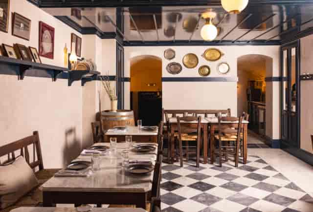 The Dining Room at The White Horse: vaulted private dining space for board dinners and networking.