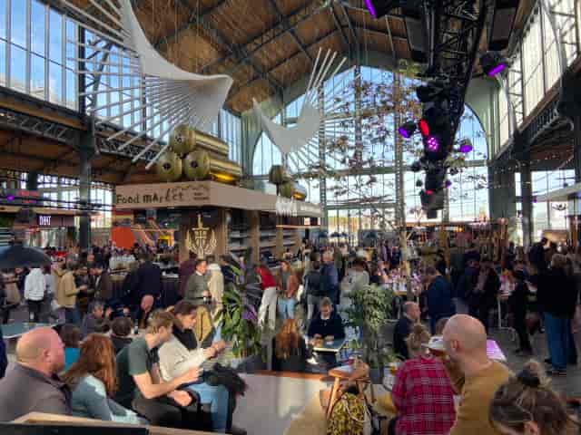 Industrial-chic Gare Maritime venue for corporate networking and communal dining events.