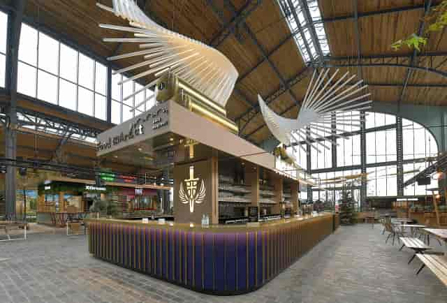 Central Grand Hall Gare Maritime: industrial-chic event venue with kinetic lighting for receptions.