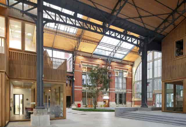 Modular Pavilions at Gare Maritime featuring industrial-chic design for networking and activations.