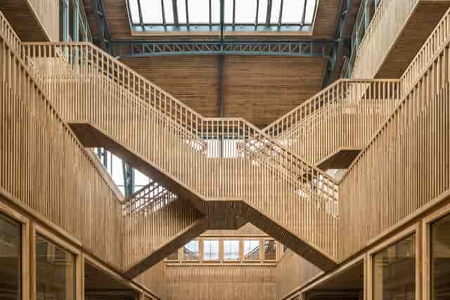 Modular pavilions in Gare Maritime atrium, ideal for professional event registration or breakouts.
