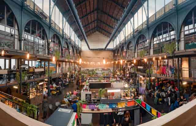 Gare Maritime food market: industrial-chic venue for experiential events and pop-up networking.