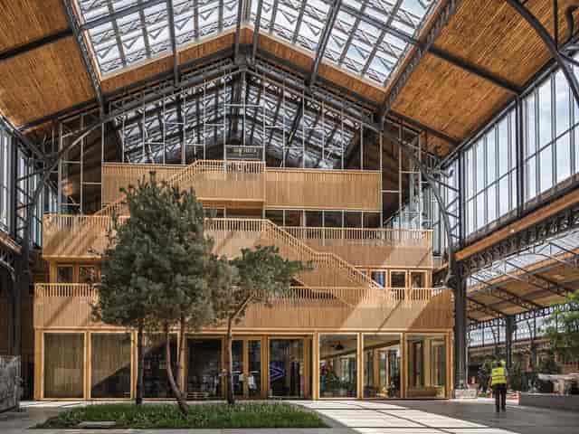 Gare Maritime industrial venue with indoor gardens for corporate events and creative pop-ups.