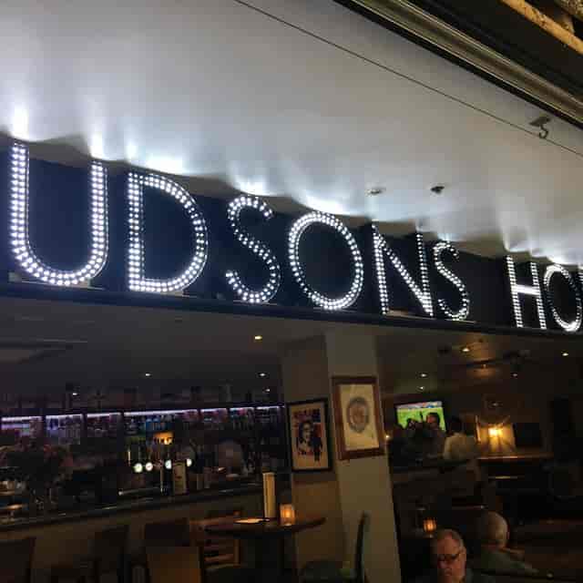Hudson's House venue with bar for networking reception and corporate event space.