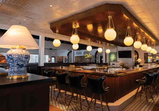 Hudson's House luxury event venue with stylish bar seating for VIP networking and cocktail parties.