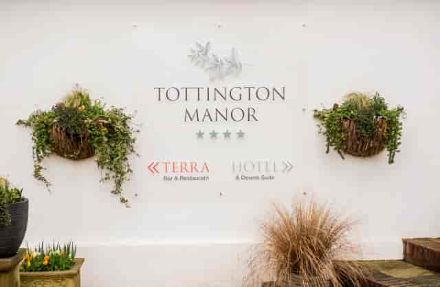 South Downs Suite wayfinding signage at Tottington Manor for corporate retreats and weddings.