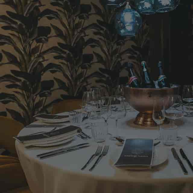 TERRA Tasting Room banquet setup for premium dinner events and sparkling wine service.