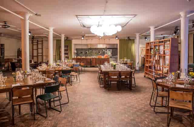 The Chainstore London industrial venue set for a corporate banquet dinner event.