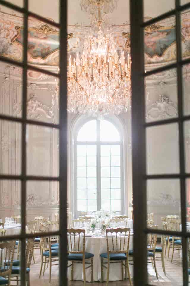 Historic event space in Impact Hub Bucharest with grand chandelier for luxury gala or VIP reception.