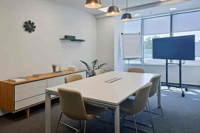 Professional boardroom at Impact Hub Bucharest for team meetings and corporate workshops.