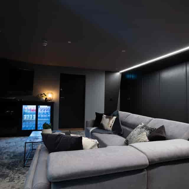 Qube Acton Studio A breakout space with sectional seating for VIP events and executive retreats.