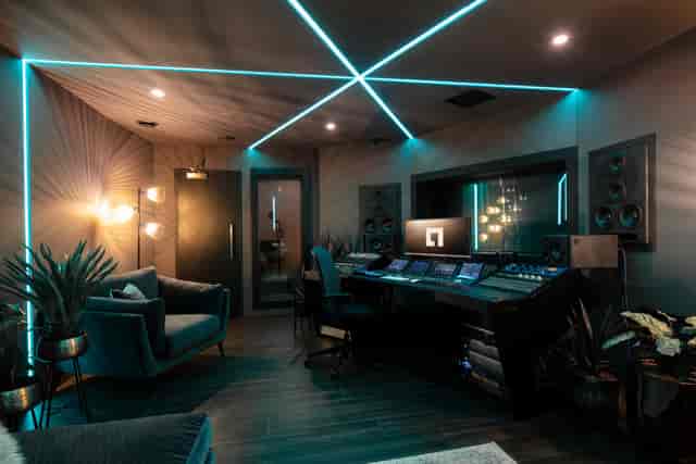 Acoustically treated Qube Acton studio with LED lighting for VIP lounges and production events.