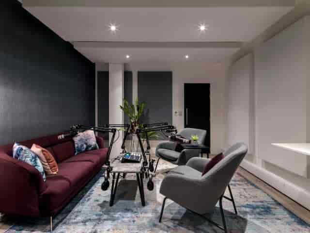 High-end podcast studio with professional audio gear for interview events.