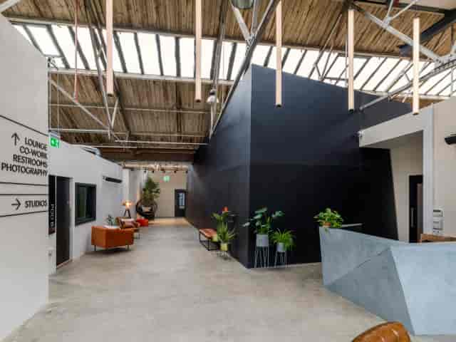 Qube Acton industrial venue with reception point for brand activations and breakout sessions.