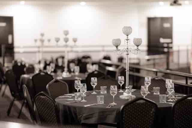Arcadia Room banquet setup with silver candelabras for elegant galas and corporate awards dinners.